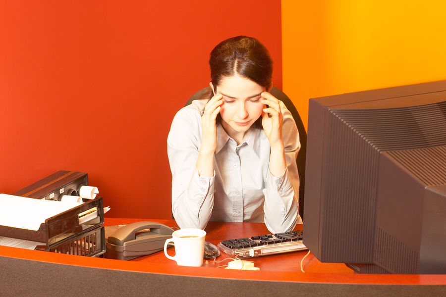 Woman getting sleepy while working