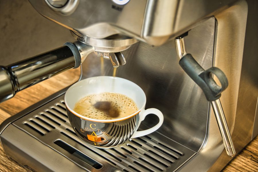 Espresso machine dispensing coffee