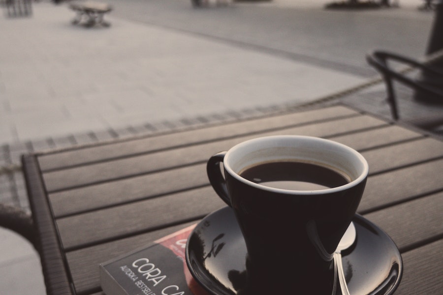 Black coffee in a black colored mug
