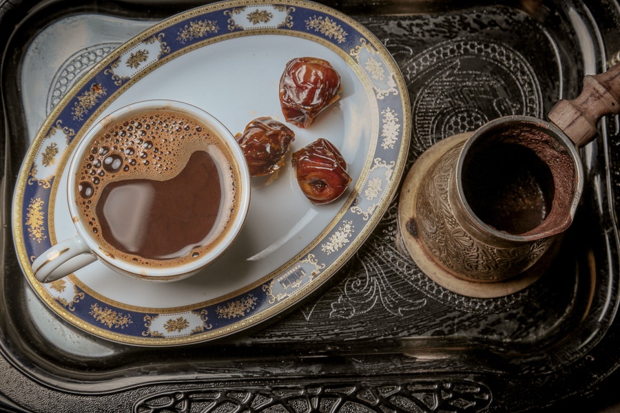 A coffee cup in a mini plate