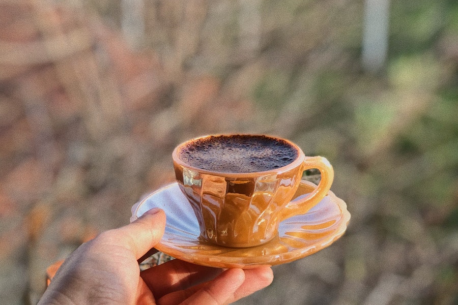 Man holding a cup of coffee