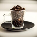 Coffee beans inside a clear coffee mug are placed on a black saucer on a white surface
